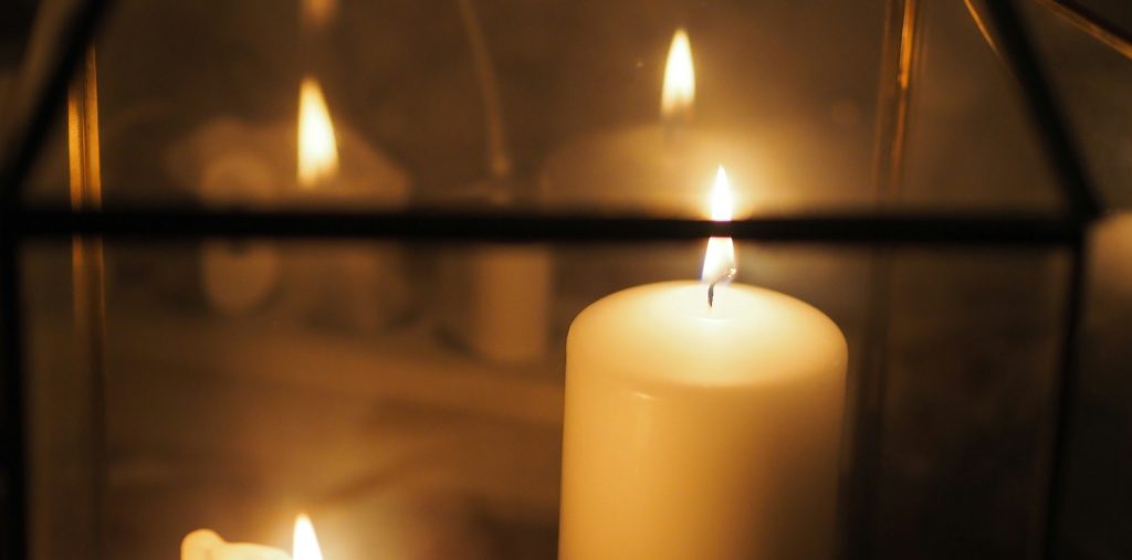 candle reflected in mirror, Ayla Alliance, Richmond, VA, End-of-Life Doula, life transition professional, loss of a loved one, after-life professional, laura chouette uoxfdtbybyk